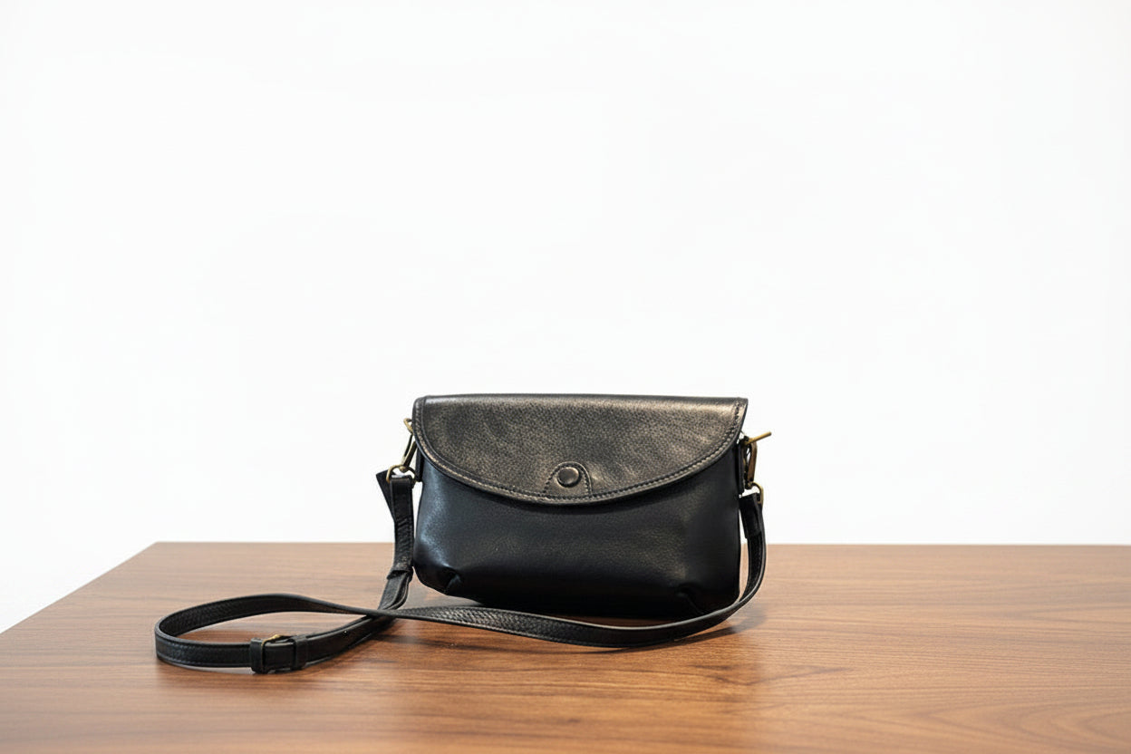 Black crossbody shoulder bag with adjustable strap 