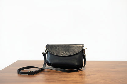 Black crossbody shoulder bag with adjustable strap 