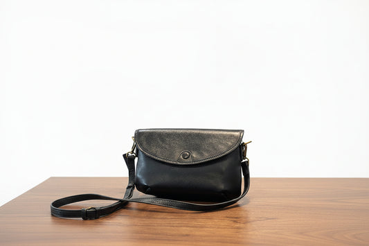 Black crossbody shoulder bag with adjustable strap 