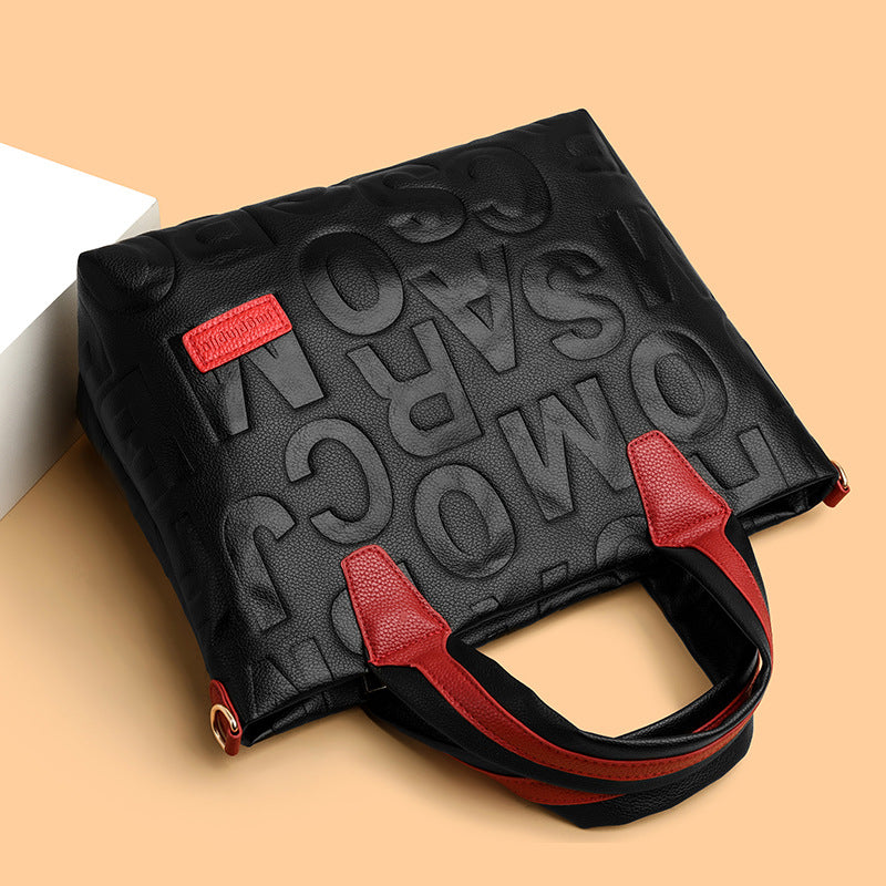 Women's handbag with multiple interior storage pockets