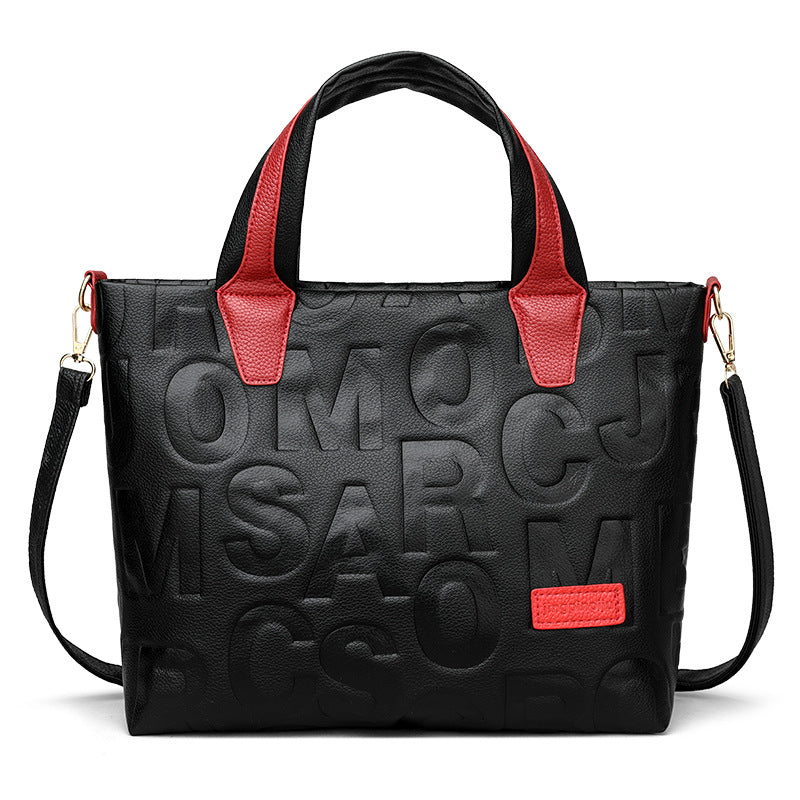Women's handbag with multiple interior storage pockets